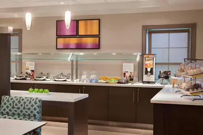 a large kitchen with a counter with a buffet at Residence Inn by Marriott Toronto Markham in Markham