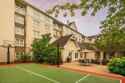 a tennis court in front of a building at Residence Inn by Marriott Toronto Markham in Markham