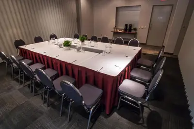 a conference room with a large table and chairs at Residence & Conference Centre - Toronto in Toronto