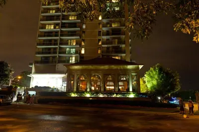 a gazebo in front of a building at night at The Waterside Inn in Mississauga
