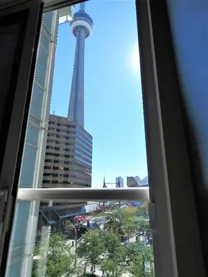a view of the space needle from a window at Upscale Suite at CN Tower, Metro Convention & Rogers Centre in Toronto