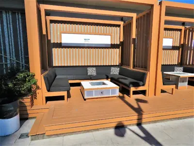 a patio with a couch and a table and chairs at Upscale Suite at CN Tower, Metro Convention & Rogers Centre in Toronto