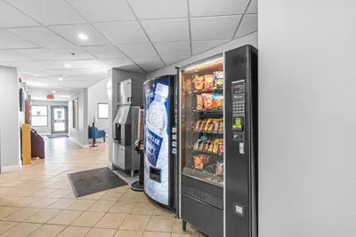 a vending machine in a room with drinks at Quality Inn & Suites in Grimsby