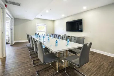 a large conference room with a long table and chairs at Quality Inn & Suites in Grimsby