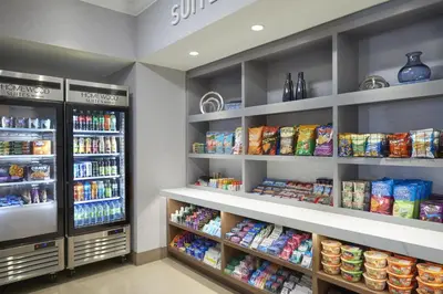 a store aisle with shelves filled with food at Homewood Suites by Hilton Toronto Vaughan in Vaughan