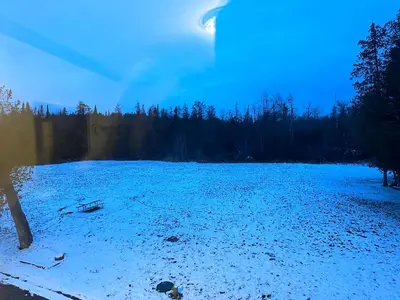 a large lake with snow on the ground at Cedar Springs Motel in Acton