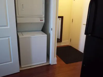 a laundry room with a washer and dryer at 2 BEDROOM 2 Bathroom Best Value Prime Location in Missisauga in Mississauga