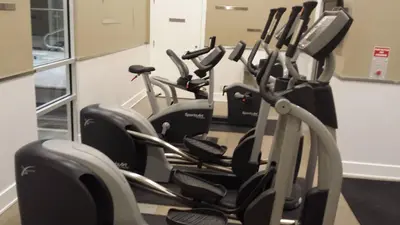 a row of exercise bikes in a gym at BEST LOCATION/SPECTACULAR VIEW 2 BEDROOMS FURNISHED CONDO S/L RENT in Mississauga