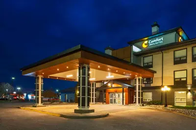 a building with a sign on top of it at Comfort Inn & Suites in Ingersoll