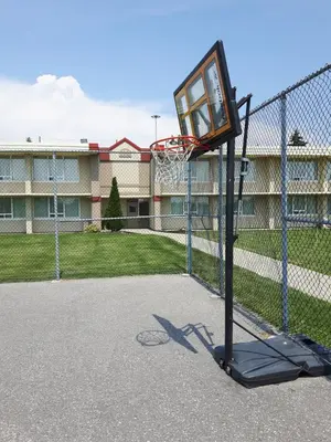 a basketball hoop in front of a building at Best Western Plus Durham Hotel & Conference Centre in Oshawa