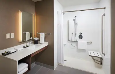 a bathroom with a sink and a shower at Staybridge Suites Niagara-On-The-Lake by IHG in Niagara on the Lake