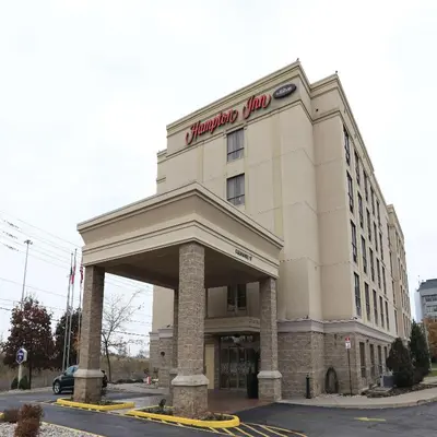 a building with a sign on top of it at Hampton Inn Toronto-Mississauga West in Mississauga