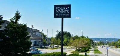 a sign that reads four points by extension at Four Points by Sheraton Barrie in Barrie