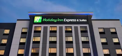 a building with a sign on the top of it at Holiday Inn Express & Suites - Brantford by IHG in Brantford