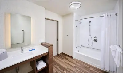 a bathroom with a sink and a shower at Holiday Inn Express & Suites - Brantford by IHG in Brantford