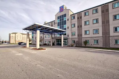 an empty parking lot in front of a building at Motel 6-London, ON - Ontario in London
