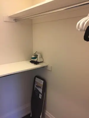 a shelf in a room with a phone on it at Comfortable private space in Pickering