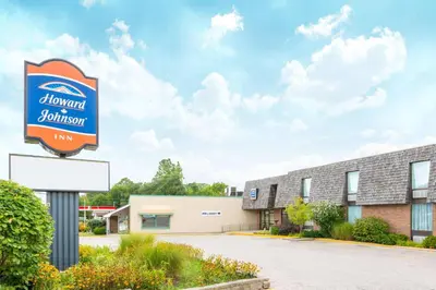 a sign for a dunnellon bourbon motel at Howard Johnson by Wyndham Tillsonburg in Tillsonburg