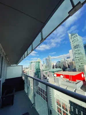 a balcony with a view of a city skyline at Luxury condo on CN TOWER in Toronto