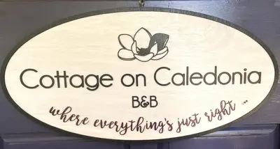 a sign that reads conference on colombo bc bc where everything was right at Cottage on Caledonia Bed & Breakfast in Stratford