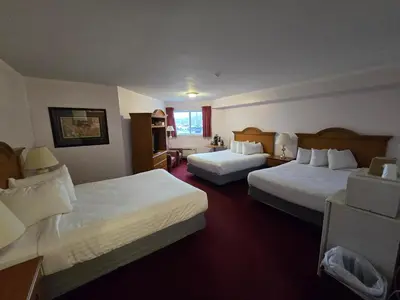 a hotel room with two beds at Travelodge by Wyndham Port Elgin in Port Elgin
