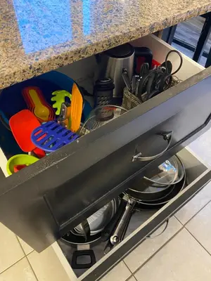 a drawer in a counter with utensils at Blue Mountain 2 Story Studio Loft in Blue Mountains
