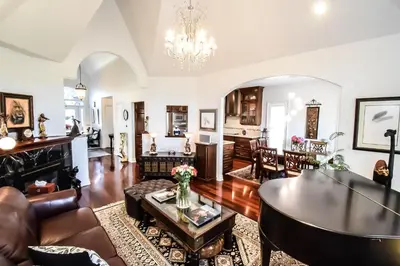 a living room with a couch and a table at Graystone Bed & Breakfast in Niagara on the Lake