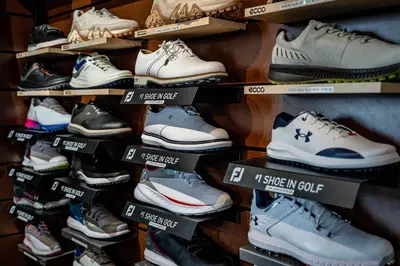 a bunch of shoes on display in a store at The Inn at Cobble Beach in Kemble