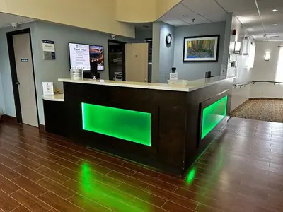 a display with green lights on a counter in a store at Best Western Little River Inn in Simcoe