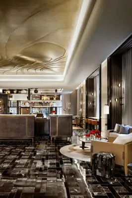 a lobby of a hotel with a coffered ceiling at The St. Regis Toronto in Toronto