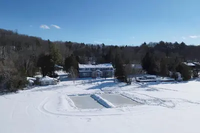 an aerial view of a house in the snow at Bonnie View Inn in Haliburton