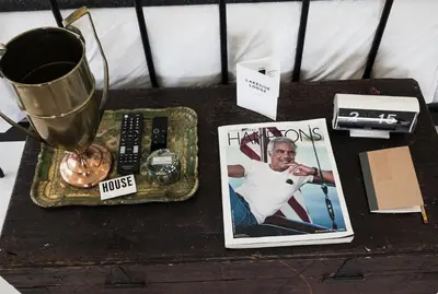 a table with a picture of a man on it at The Lakeside Prince Edward County in Wellington