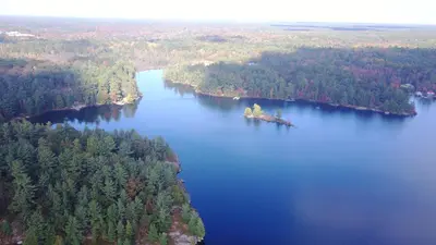 an island in the middle of a large lake at Four Ninety Muskoka B & B in Gravenhurst