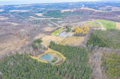 an aerial view of a golf course in a forest at Northumberland Heights Wellness Retreat & Spa in Cobourg