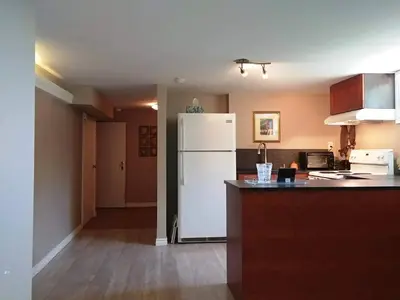 a kitchen with a white refrigerator in a room at Bradford Vacation in Bradford