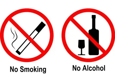 two signs that say no smoking and no alcohol at Village at York U in Toronto
