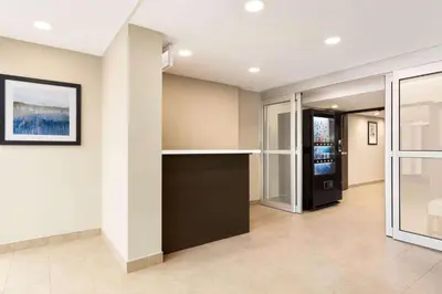 a hallway of a home with a wall at Wyndham Garden Niagara Falls Fallsview in Niagara Falls
