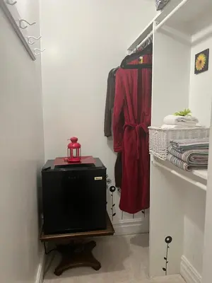 a room with a small television in a closet at Cozy House B&B in Niagara Falls