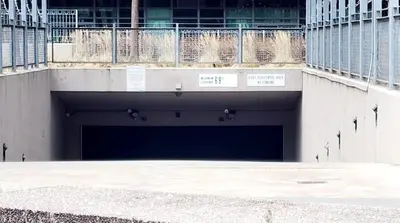 a large parking garage in the middle of a building at Lakefront living Downtown Toronto - Free Parking, Gym, Indoor Pool in Toronto