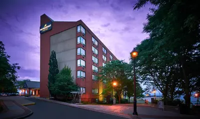a building with a sign on the side of it at Waterfront Hotel Downtown Burlington in Burlington