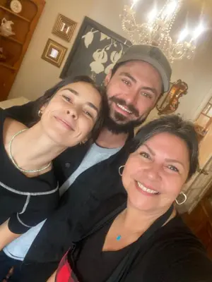 a man and two women posing for a picture at Blue Spruce Bed and Breakfast Muskoka in Gravenhurst