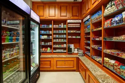 a grocery store aisle with a lot of products at Hilton Garden Inn Toronto/Markham in Thornhill
