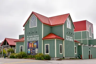 a large green building with a red roof at Hammer Haus in Waterloo