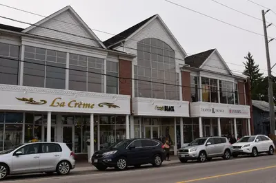 a building with cars parked in front of it at Hammer Haus in Waterloo