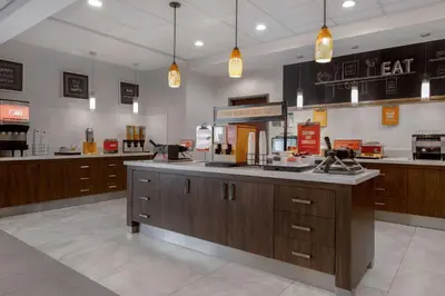 a large kitchen with a counter in a store at Hampton Inn by Hilton Brampton - Toronto in Brampton