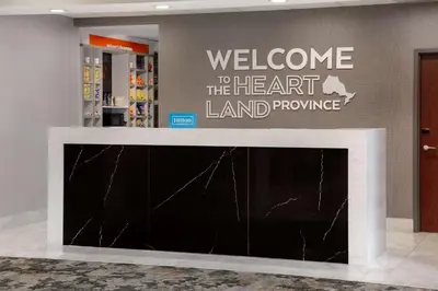 a welcome to the line art land pumping sign on a wall at Hampton Inn by Hilton Brampton - Toronto in Brampton