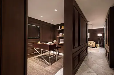 a hallway with a desk in a room at Shangri-La Toronto in Toronto
