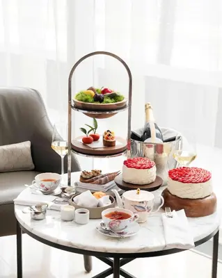 a table with food and drinks on a table at Shangri-La Toronto in Toronto