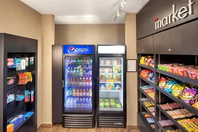 a grocery store with a soda machine in a store at Residence Inn by Marriott Toronto Mississauga West in Mississauga