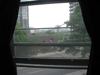 a window with a view of a city street at McBayne House in Hamilton